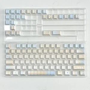 Lifestyle image of Cloud Floral keycaps enhancing a minimalist desk setup