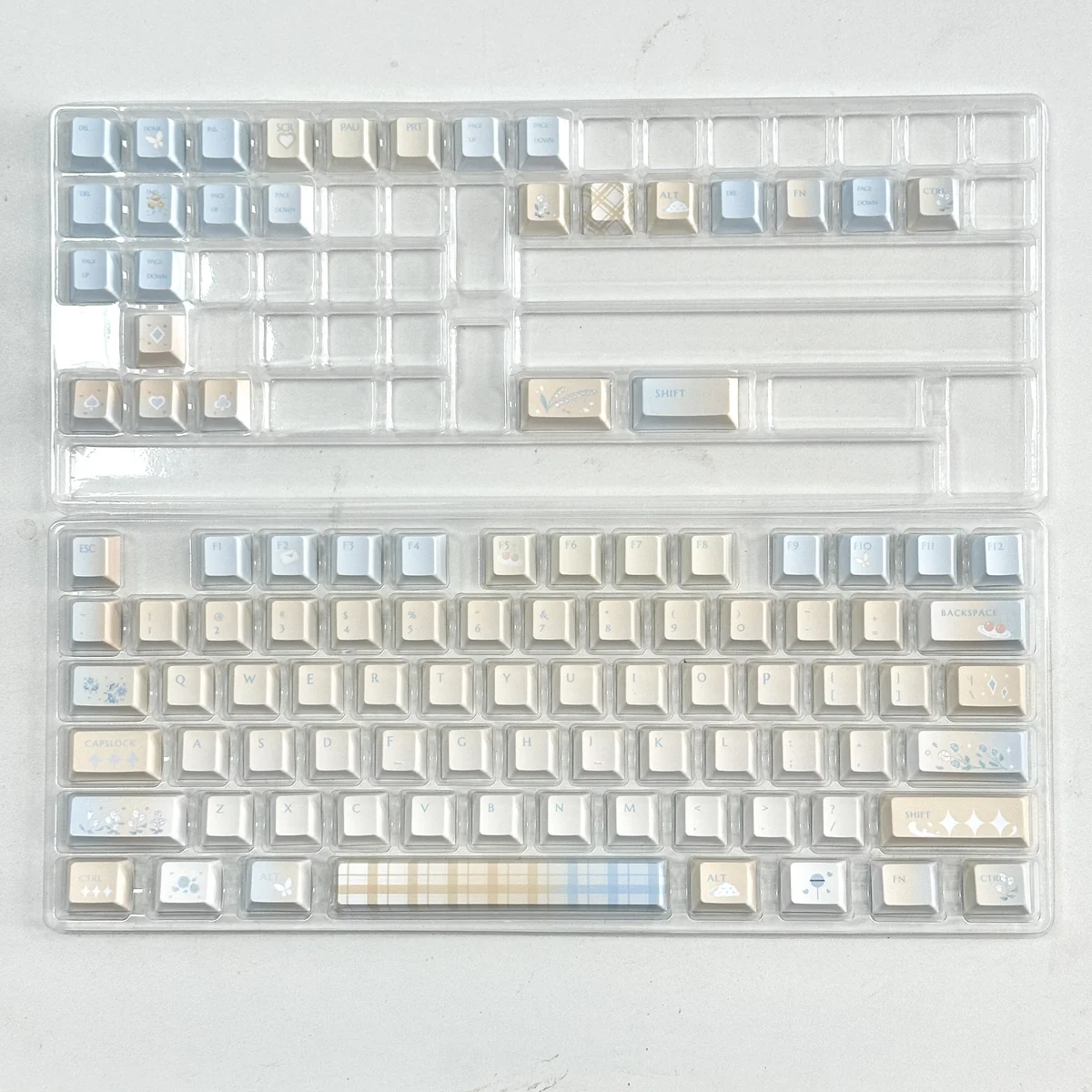 Lifestyle image of Cloud Floral keycaps enhancing a minimalist desk setup