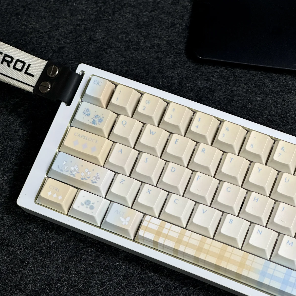 Close-up of Cloud Floral keycaps highlighting the dye-sublimated floral patterns and Cherry profile