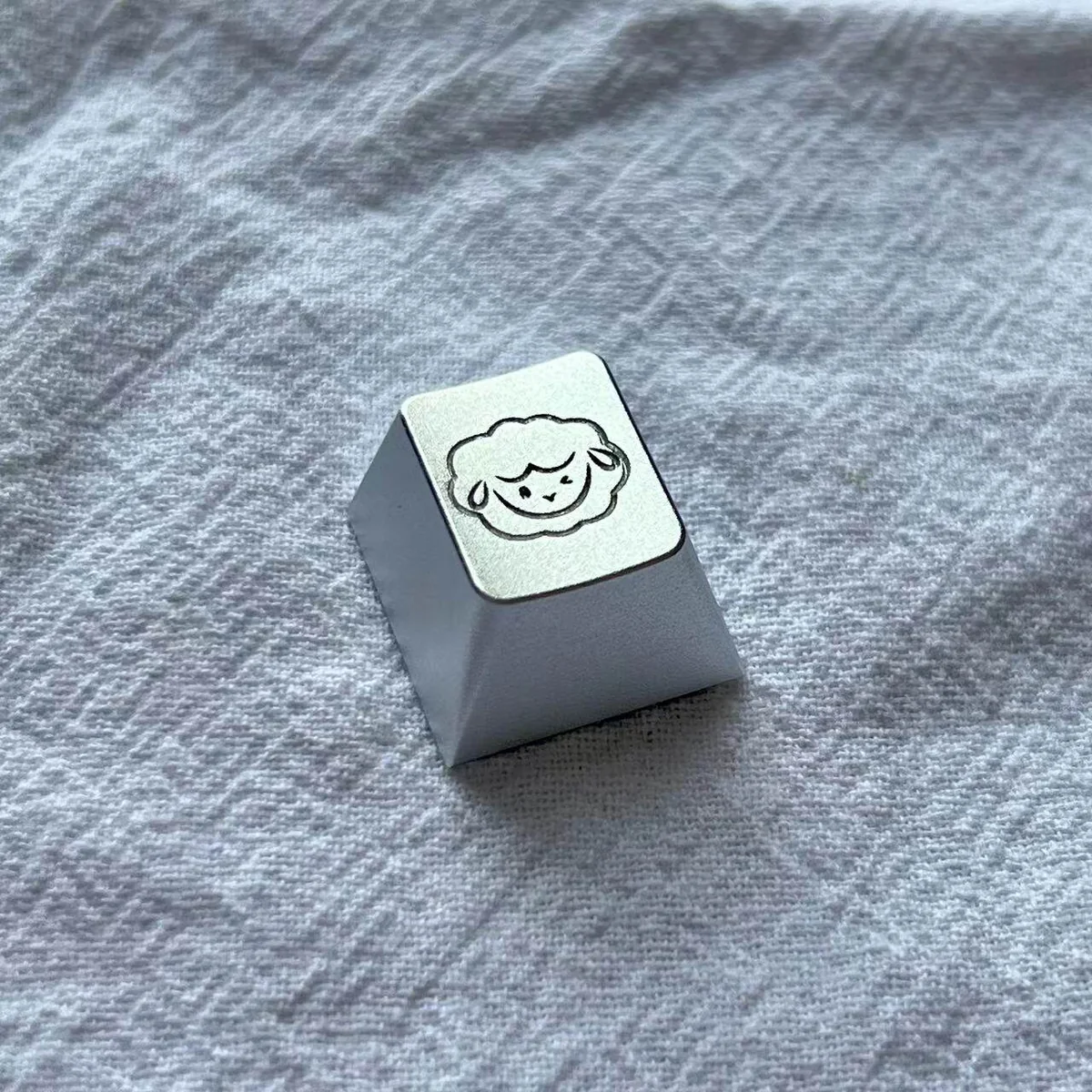Macro shot of the intricate details on the Cute Sheep Keycap