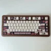 Close-up of Dark Rose PBT Dye-sub Keycap Set with intricate red and black floral design