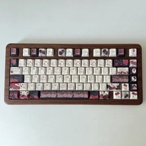 Close-up of Dark Rose PBT Dye-sub Keycap Set with intricate red and black floral design