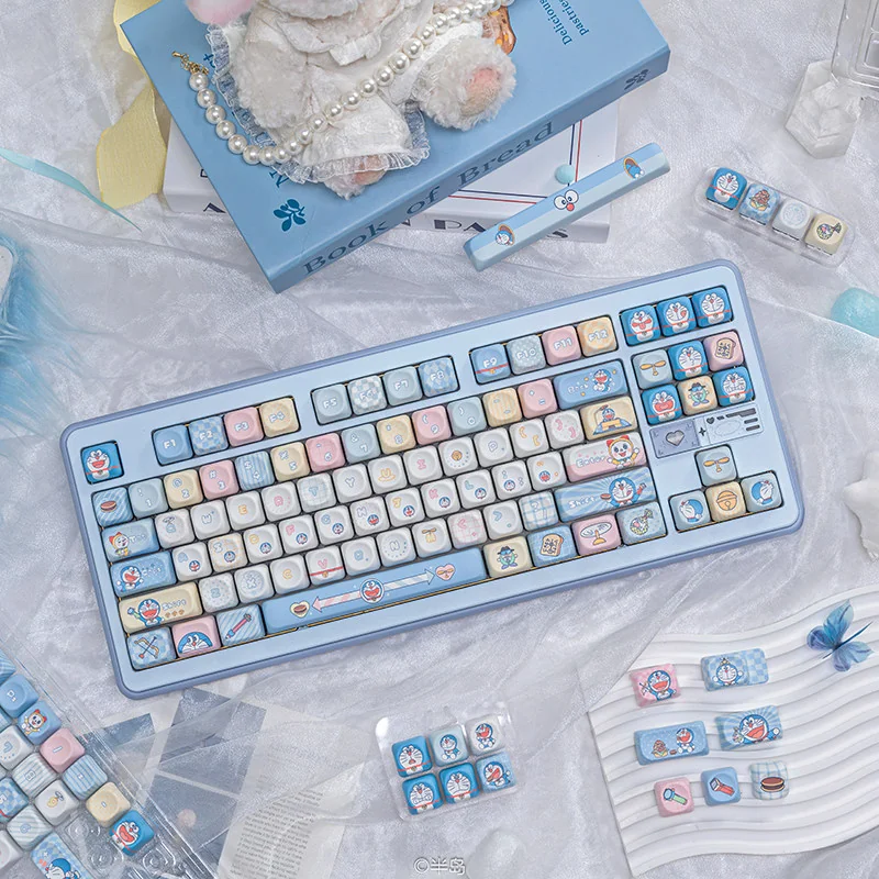 Side view of the Doraemon MOA profile keycaps, showing their uniform height and ergonomic design.