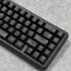 Texture shot of a PBT keycap from the Baroque set, emphasizing its durable and shine-resistant surface.