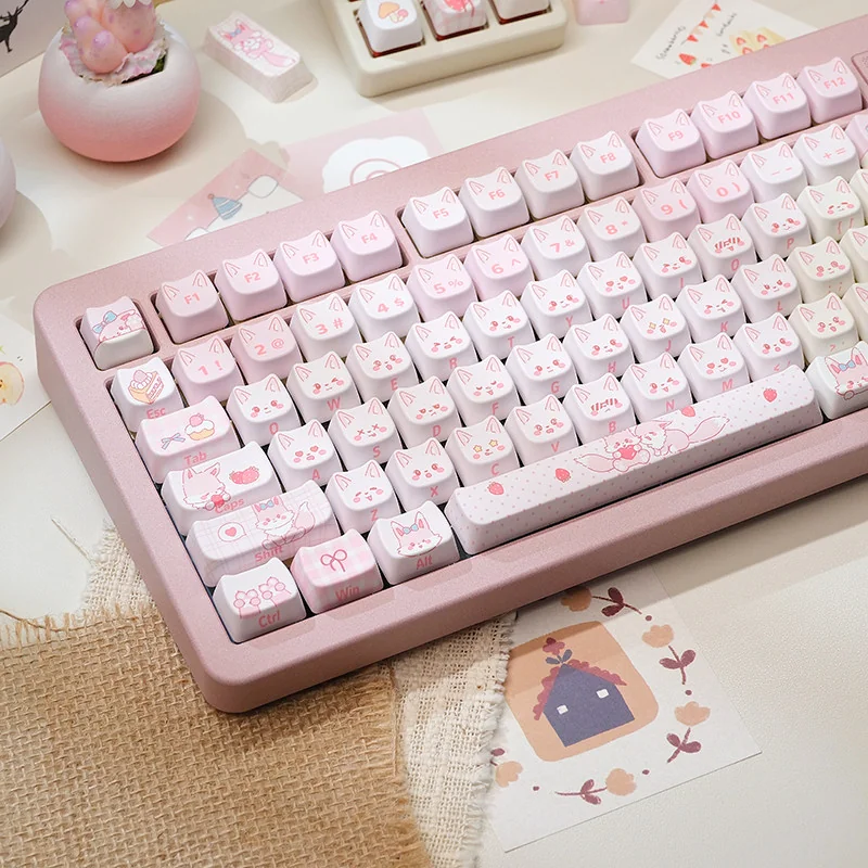 Close-up view of Fox Dessert MAO profile keycaps, highlighting dye-sublimated pink fox and dessert legends.