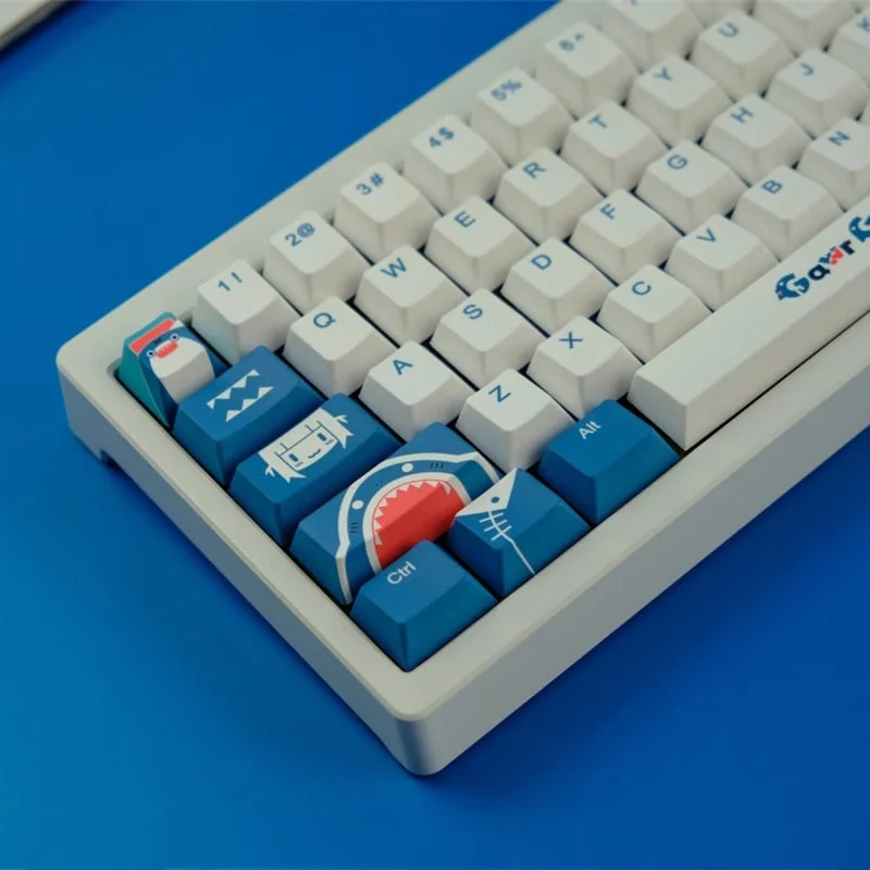 Close-up of Gawr Gura themed keycaps, highlighting crisp dye-sublimated legends and PBT texture.