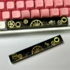 Handcrafted resin Gear Spacebar Keycap with intricate industrial gears encased, on a mechanical keyboard.