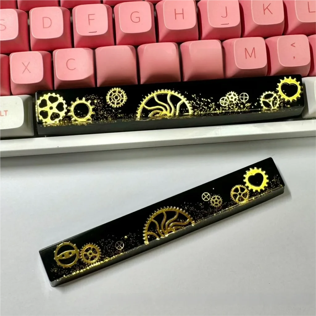 Handcrafted resin Gear Spacebar Keycap with intricate industrial gears encased, on a mechanical keyboard.