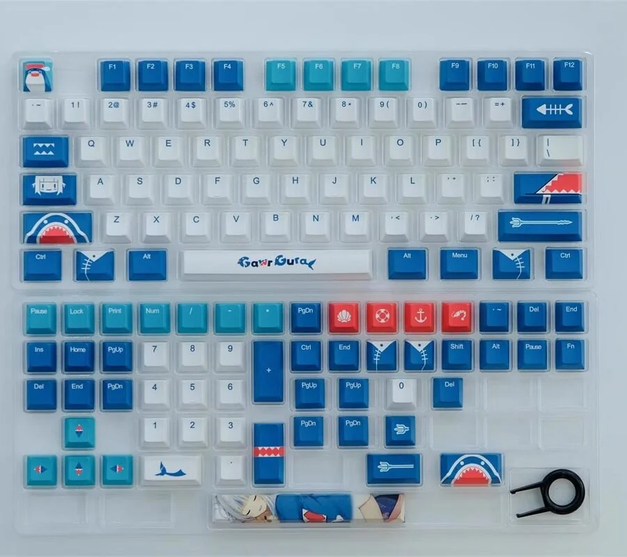 Stylized image of Gawr Gura keycaps with Hololive VTuber branding elements.