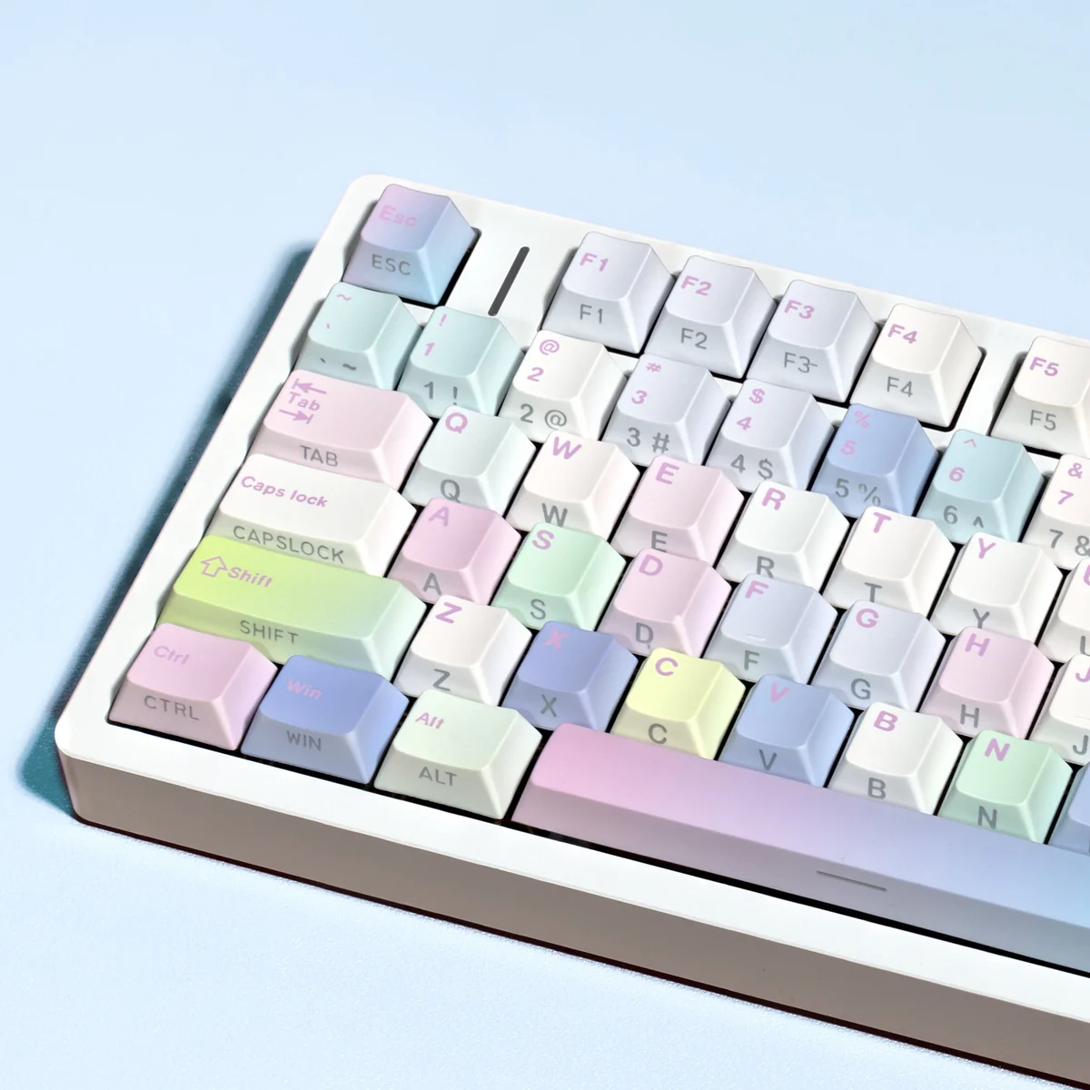 Close-up of iridescent PBT keycaps with ethereal bubble design