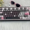 Lace Cat keycaps demonstrating the front lettering option
