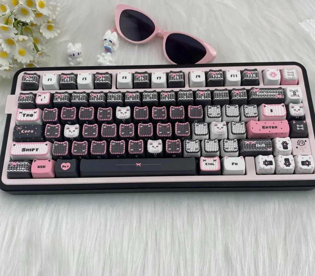 Lace Cat keycaps demonstrating the front lettering option