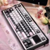 Close-up of Lace Cat keycaps showcasing intricate lace patterns and PBT texture