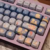 Layout compatibility example of the 132-key Le Petit Prince set, showing different keyboard sizes and keys included.