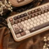 Close-up of PBT dye-sublimated keycaps with book-themed legends