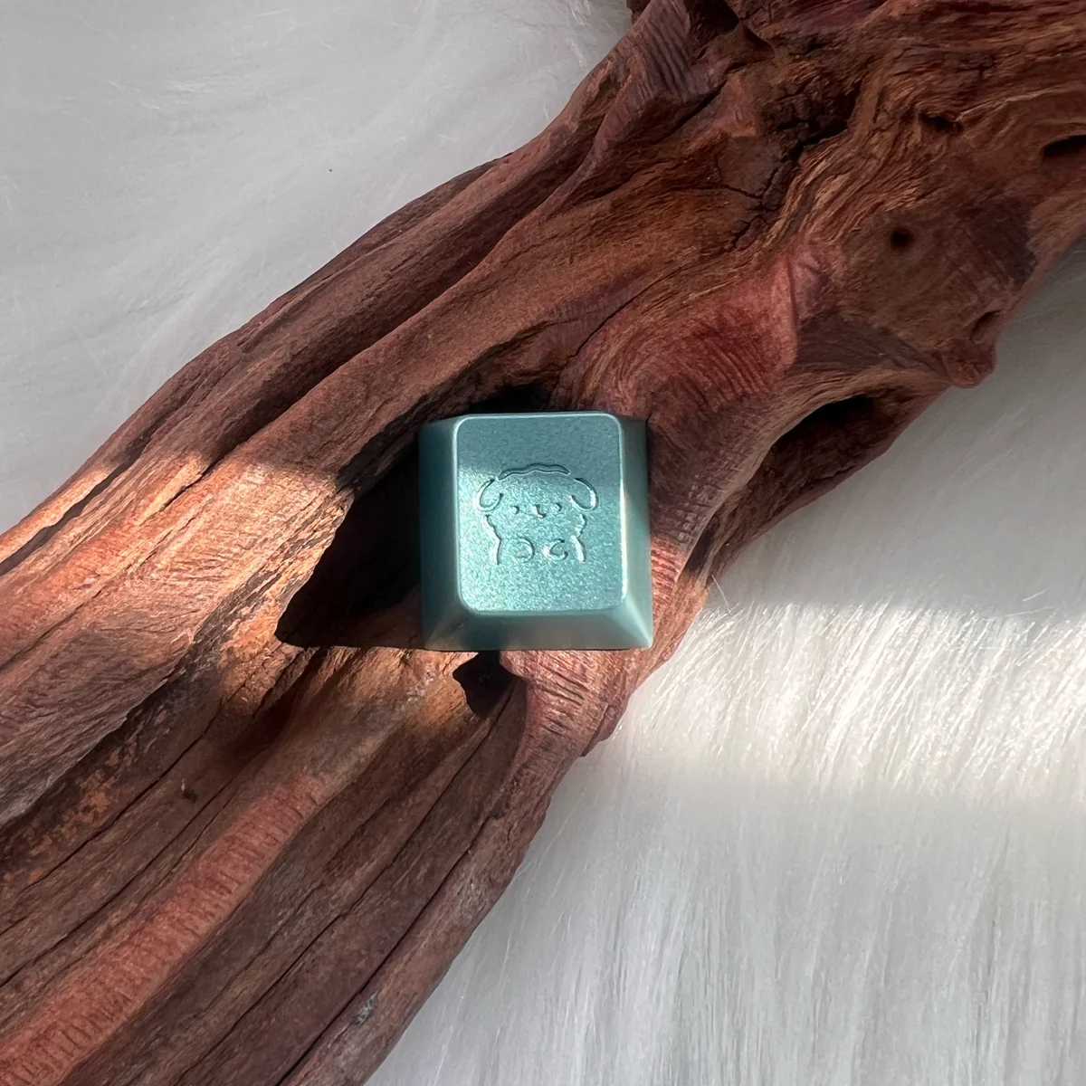Maltese Dog Aluminum Keycap in 'Glacier Island' option, serene blue