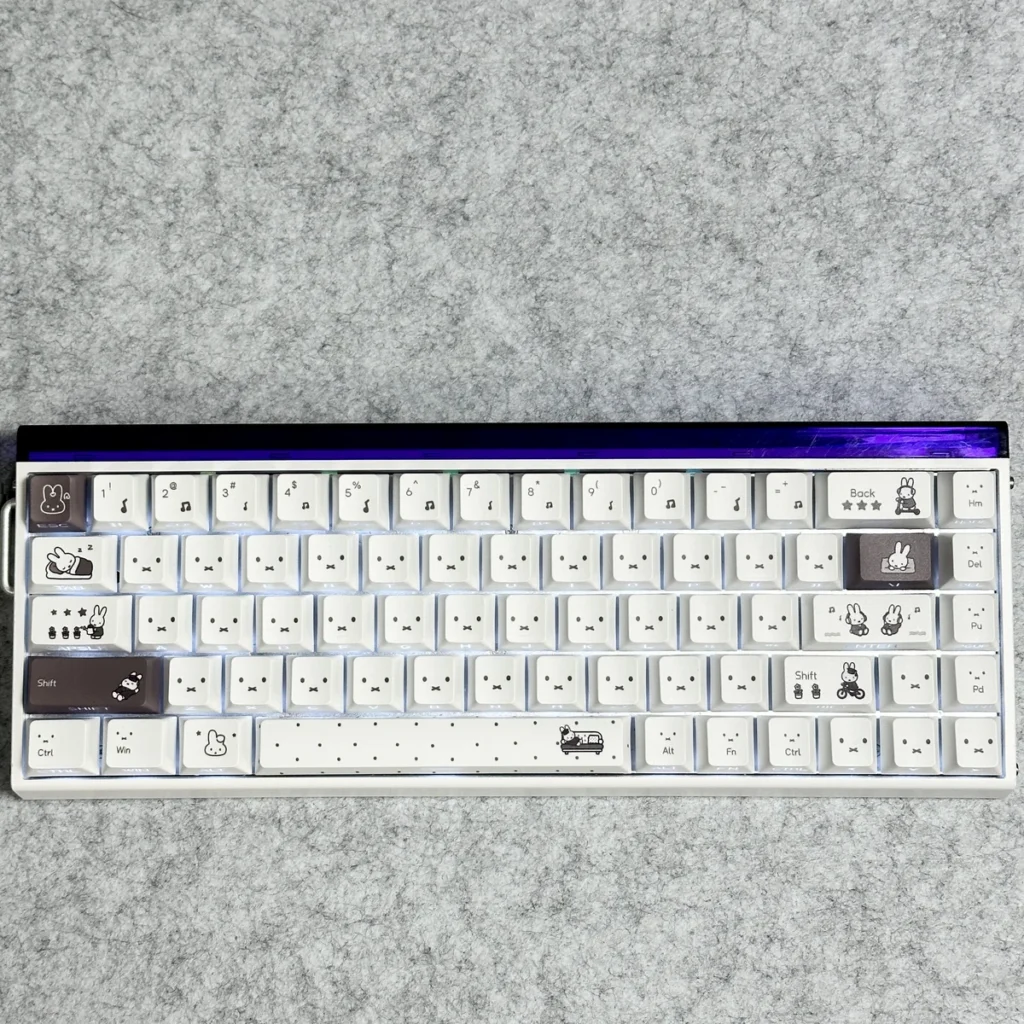 Miffy PBT Keycap Set installed on a mechanical keyboard, showcasing side-printed translucent legends and glowing effect