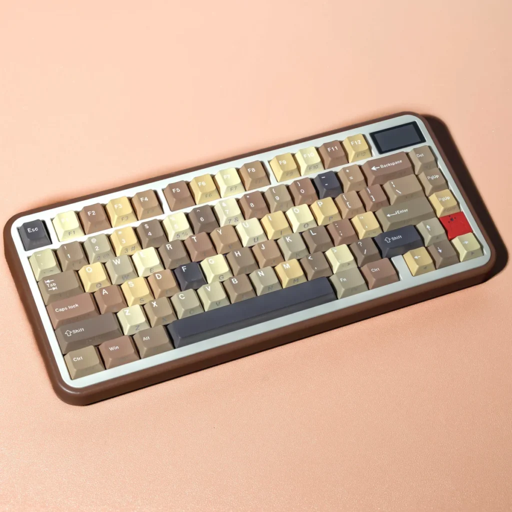 Milk Coffee PBT Keycap Set on a white keyboard, showcasing creamy white and soft brown colors.