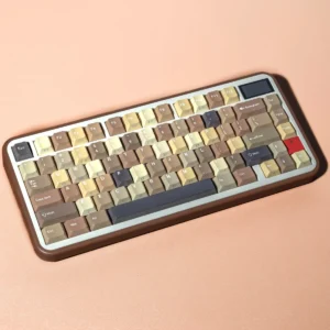Milk Coffee PBT Keycap Set on a white keyboard, showcasing creamy white and soft brown colors.