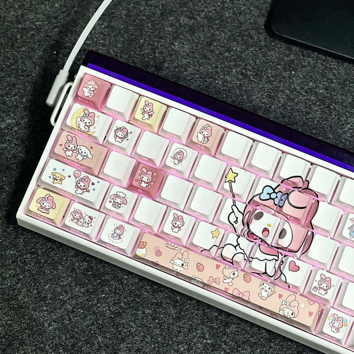 Close-up view of My Melody keycaps showing crisp side-printed characters and PBT texture