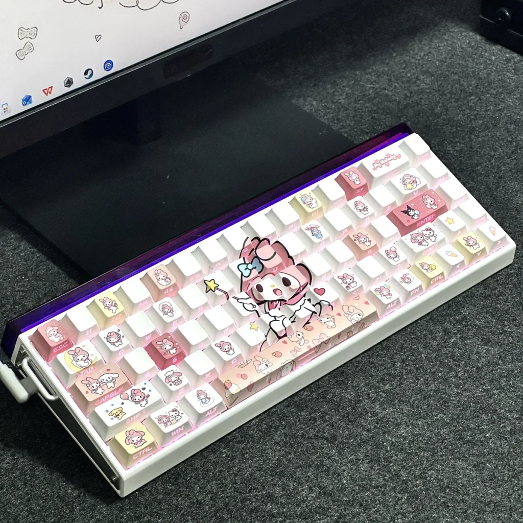 Angle shot of My Melody themed keycaps showcasing the pastel pink and white aesthetic