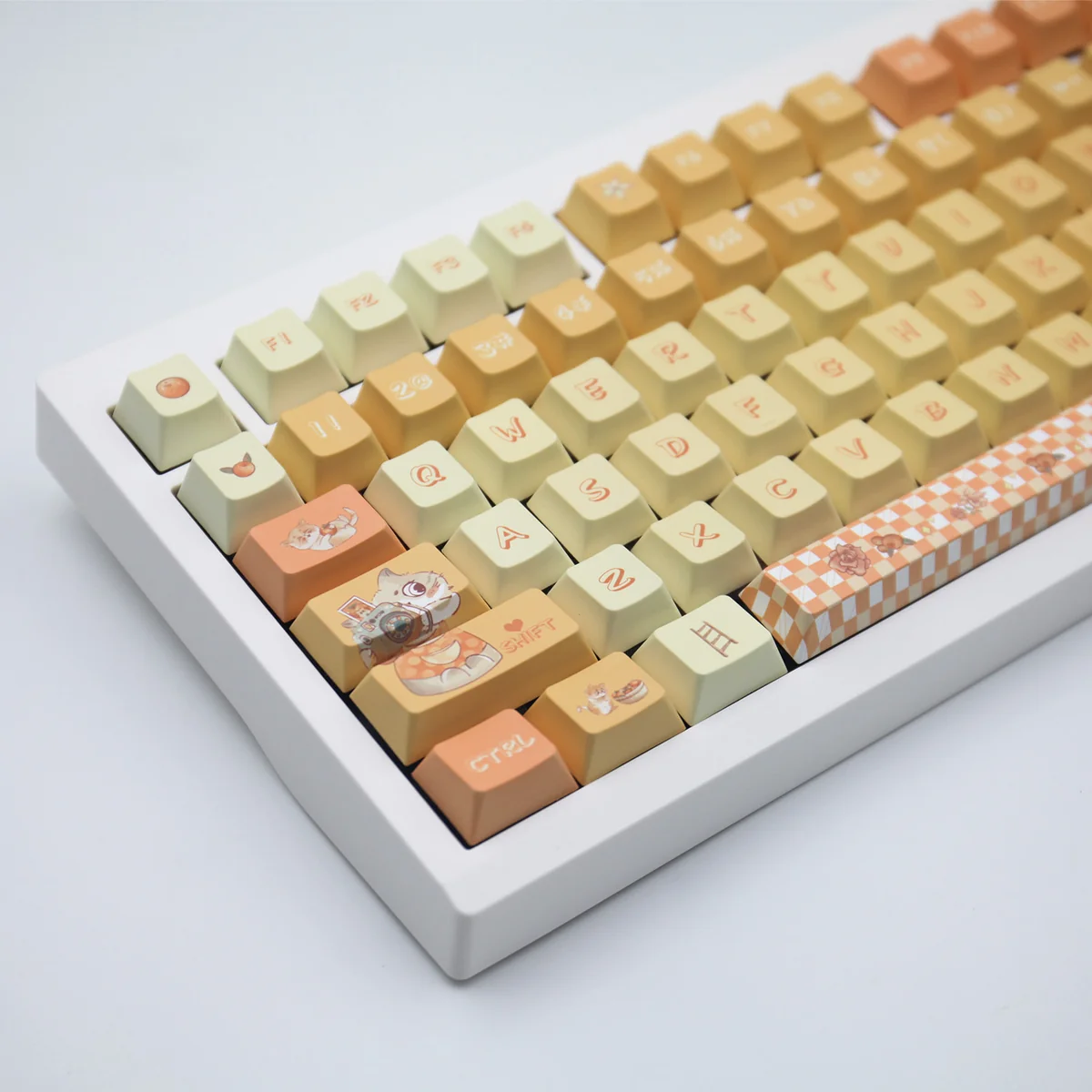 Lifestyle image of the Orange Garden Keycap Set integrated into a clean, nature-themed desk setup.