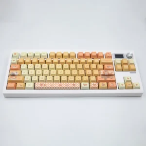 Orange Garden PBT Dye-sublimation Keycap Set on a mechanical keyboard, showcasing vibrant orange and green keys.