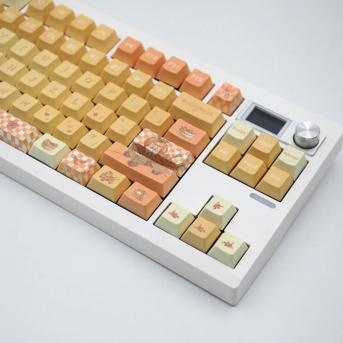 Macro shot of a single Orange Garden keycap, focusing on the matte PBT texture and crisp legend.