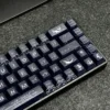 Detail shot of the PBT keycaps with dye-sublimated legends, part of the Poseidon Keycap Set.