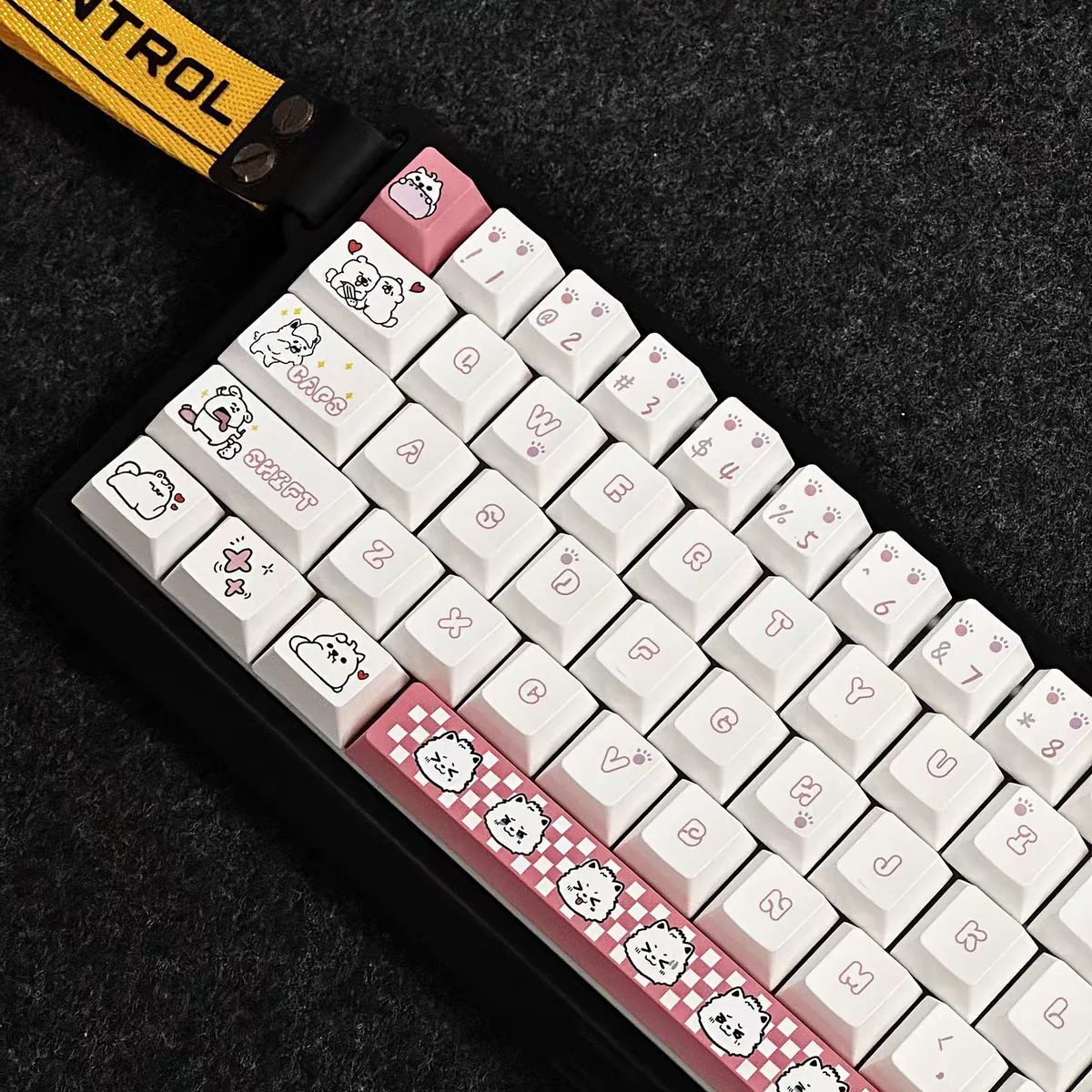 Close-up of dye-sublimated pink puppy keycap design