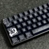 Close-up of the Poseidon artisan keycap, highlighting the resin sculpting and mythology theme.