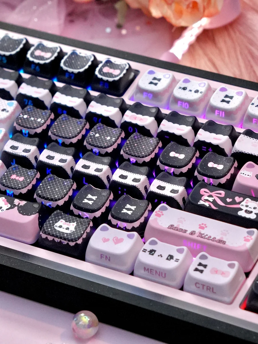 Detail of side-engraved legends on Lace Cat keycaps, highlighting dye-sublimation quality