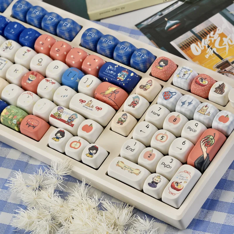 Side profile view of Cherry profile Snow White keycaps, demonstrating their ergonomic sculpt.