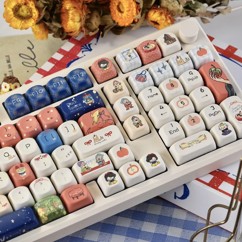 Snow White Keycap Set mounted on a pastel-colored mechanical keyboard, creating an enchanting desk setup.