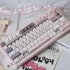 Close-up of a Strawberry Rabbit keycap, highlighting the detailed pastel illustration of a rabbit and strawberries