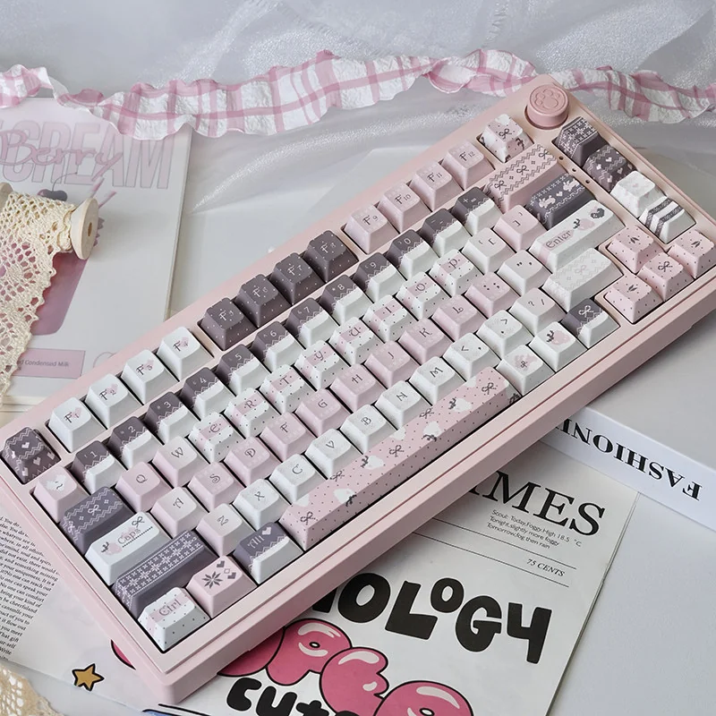 Close-up of a Strawberry Rabbit keycap, highlighting the detailed pastel illustration of a rabbit and strawberries