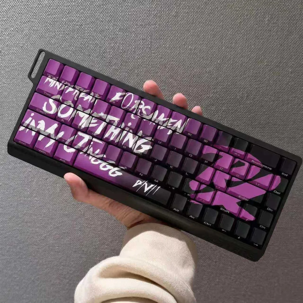 Close-up of a Dye-Sublimated PBT Valorant PRX keycap, showcasing texture