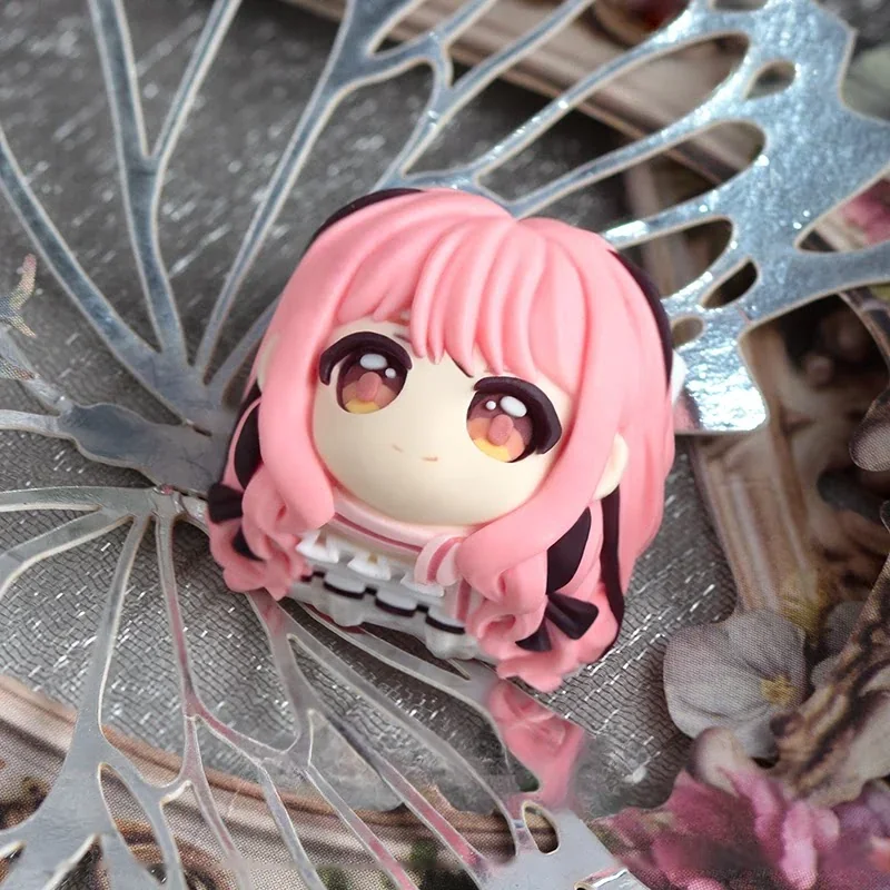 Handcrafted resin keycap featuring whimsical Nikki character