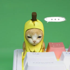 Adorable Banana Cat Resin Keycap on a mechanical keyboard, showcasing its whimsical design.