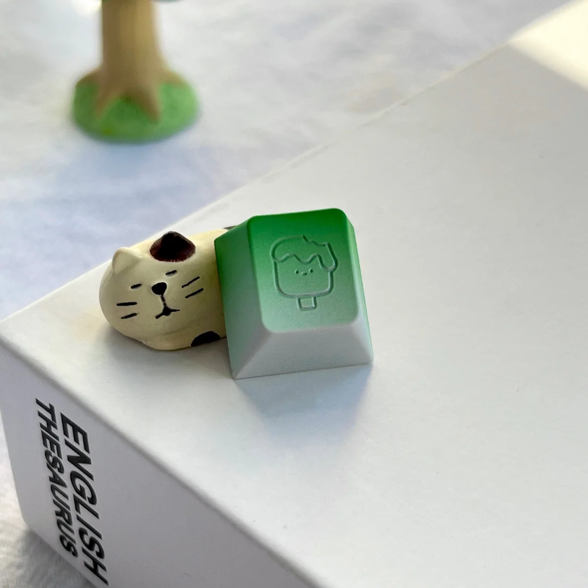 Detailed view of Whimsical Blueberry Ice Cream Keycap, metallic finish