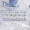 Close-up of Bunny Dessert MOA keycaps on a white mechanical keyboard, showcasing whimsical bunny and sweet treat designs.