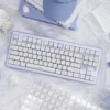 Bunny Dessert keycaps integrated into a pastel-themed desk setup, featuring a matching desk mat and accessories for a cohesive look.