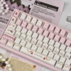 Close-up of Cherry Cake keycaps showing detailed cherry and cake motifs