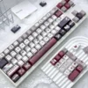 Side view of Cherry profile Butterfly PBT keycaps, highlighting ergonomic sculpting.