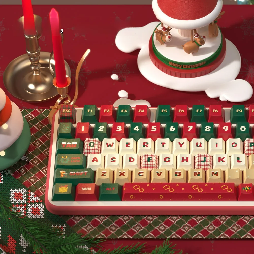 Close-up of dye-sublimated Christmas tree and snowflake designs on PBT keycaps.