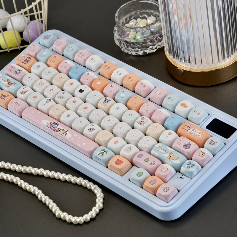 Digimon keycap set displayed neatly, showing all 132 keys for full layout compatibility.