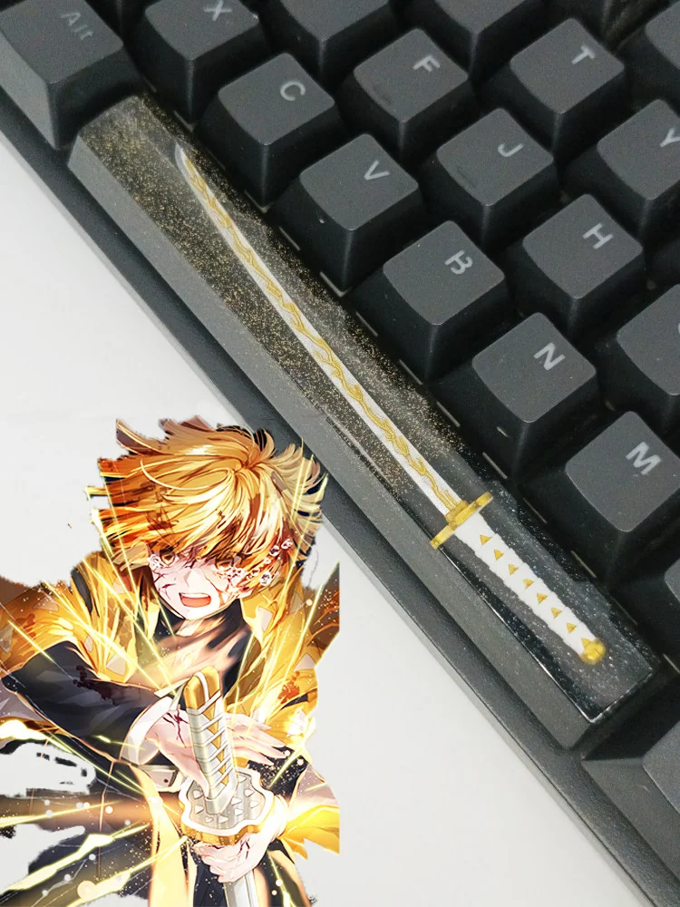 Collection of Demon Slayer spacebar keycaps in different character options