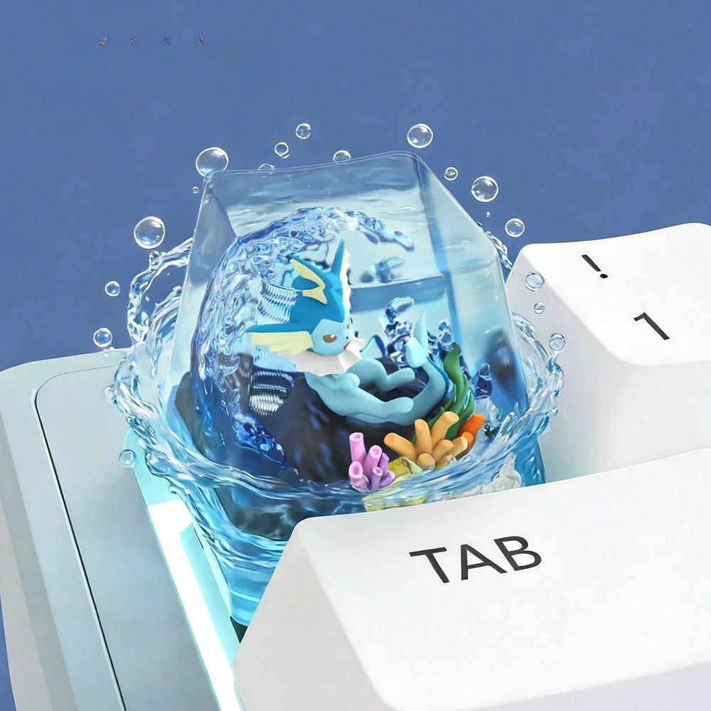 Close-up of the Vaporeon keycap detailing its fins, serene face, and intricate resin work