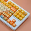 Side profile of Duck & Flower MOA Whimsical Duck & Flower MOA PBT showing keycap set shape and fit