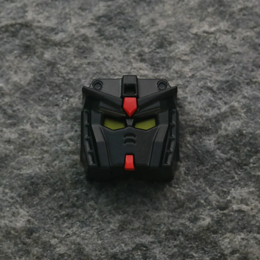 Mobile Suit Gundam RX-78-2 metallic keycap glowing on a backlit keyboard